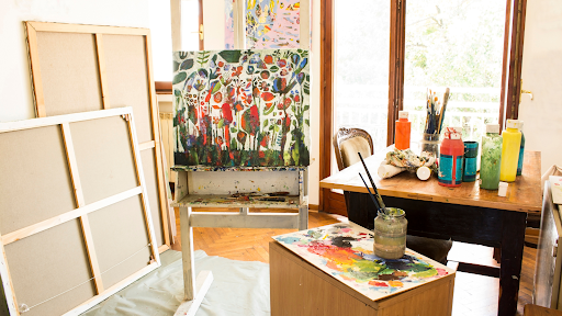 Art studio with artwork on an easel