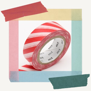Roll of decorative paper masking tape from MT with a striking red striped pattern